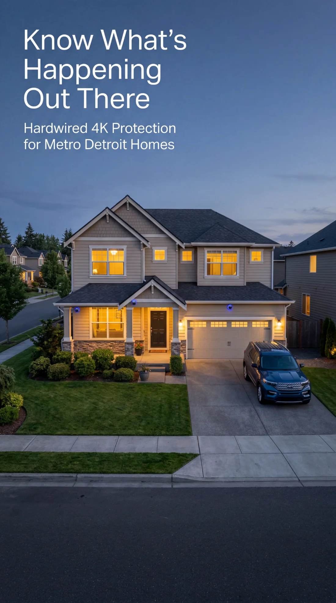 A Metro Detroit two-story home at dusk with warm lights on and security cameras installed under the eaves — hardwired 4K residential protection by Security Camera Guru